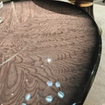 Designer Nesting Coffee Tables with Organic Curves and Layered Silhouettes